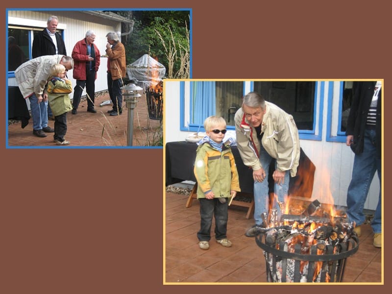 Christian mit Enkel am Feuer